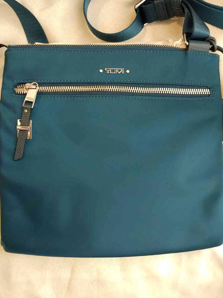 TUMI Voyageur Tula Crossbody Bag Purse Dark Turquoise Blue and Silver 8 inch