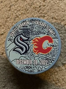 SEATTLE KRAKEN Calgary Flames Matchup Game PUCK 12/28/22 CPA Exclusive - Picture 1 of 2