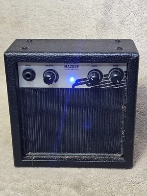 First Act Guitar Amplifier MA2039. Only 6 3/4" x 6 3/4". Power's on w/ Batteries - Image 1 of 3