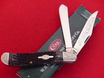 Case XX USA 1998 scrolled bolsters black bone Limited 6240 dogleg trapper knife - Image 1 of 4