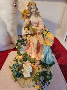 Ángel musical de fibra óptica sosteniendo un arpa con un niño hallazgo patrimonial de colección - Imagen 1 de 9