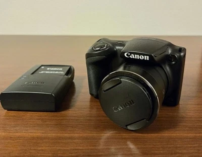 Cámara digital compacta Canon PowerShot SX400 IS con estuche cargador batería Foto 1 de 4