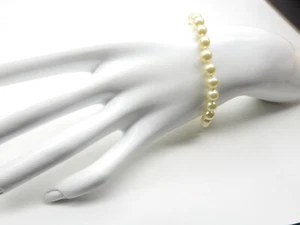 Pulsera de colección con cuentas de ley de vidrio blanco anudado a mano - Imagen 1 de 4