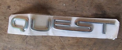 NOS NEW 1999 2000 2001 2002 2003 2004 2005? Nissan QUEST emblem  - Image 1 of 2