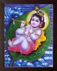 Bal Krishna Lying Down on a Leaf Religious HD Print Painting In Wooden Frame