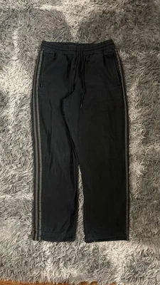 Pantalones a rayas Adidas Ripstop negros medianos para hombre Foto 1 de 4