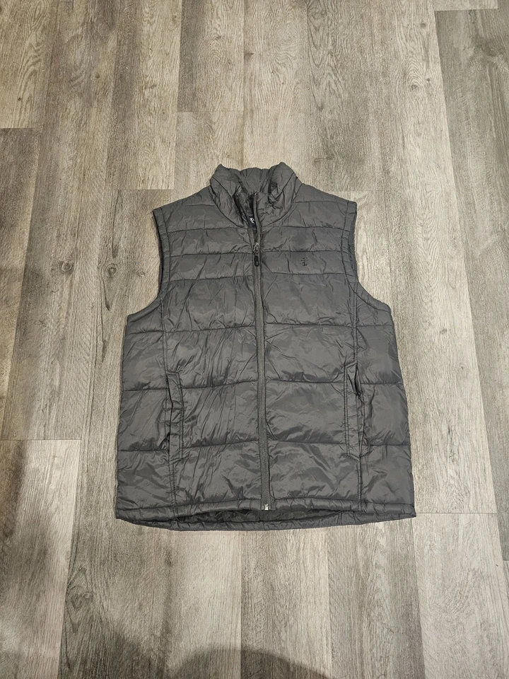 Chaleco acolchado negro Izod para hombre mediano bolsillos con cremallera completa Foto 1 de 1