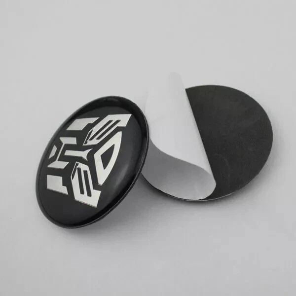 4 Piezas Transformers Autobots Calcomanía Cúpula Metal Rueda Centro Pegatina 2.2" Foto 1 de 2