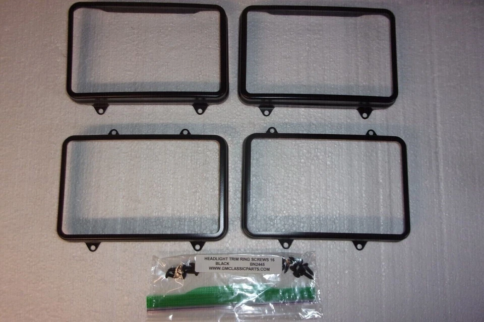 HEADLIGHT TRIM RINGS 4 BLACK 82-87 EL CAMINO G BODY 82-92 F BODY NEW DM1173.4K Foto 1 de 1
