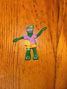 "Figuras Gumby de 3""".  Guitarra y turista. - Imagen 1 de 2