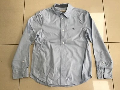 Camisa azul niño talla 9-10 de H&M  Foto 1 de 2