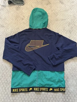 Jaqueta corta-vento Nike Dri-FIT média “Coringa” BV3303-340 colorida - Imagem 1 de 4