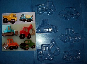 SIX MEDIUM SIZED CONSTRUCTION VEHICLES CHOCOLATE MOULD OR PLASTER MOULD