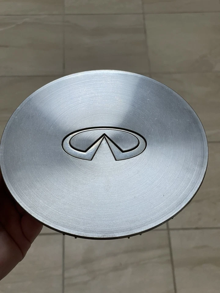 93 94 95 96 97 INFINITI J30 OEM TAPACUBOS CENTRAL 4031510Y10 73708 73709 LENGÜETA ROTA Foto 1 de 4