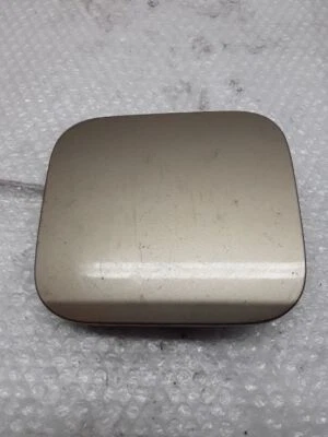 Puerta de llenado de combustible gas dorado Ford Taurus Z-35P 2001 Foto 1 de 3