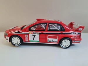 657- Scalextric Coche MITSUBISHI LANCER EVO VII MAKINEN RALLY SLOT CAR #7 - Imagen 1 de 4
