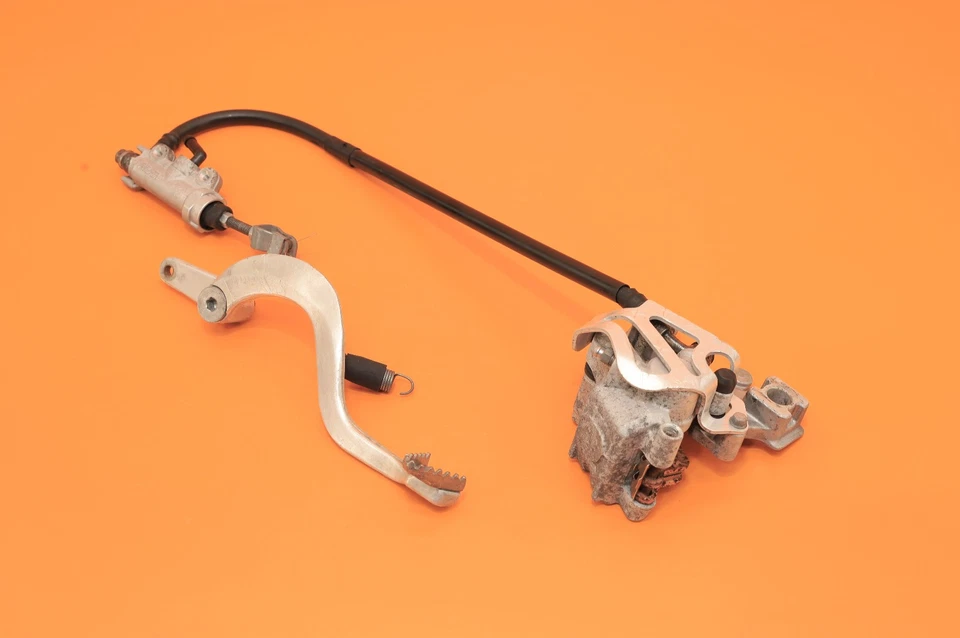 96-07 CR85R CR85 2003 OEM Pinza de freno trasera Soporte Cilindro maestro Manguera Palanca Foto 1 de 4