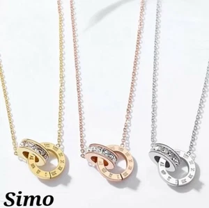 COLLANA DONNA ACCIAO PENDENTE ZIRCONI NUMERI ROMANI ORO ROSA ARGENTO SEXY REGALO - Foto 1 di 5