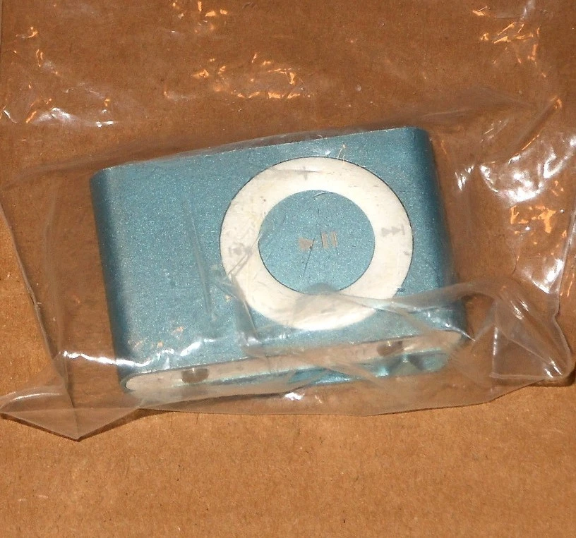 1  LIGHT BLUE APPLE iPOD SHUFFLE - Image 1 of 1