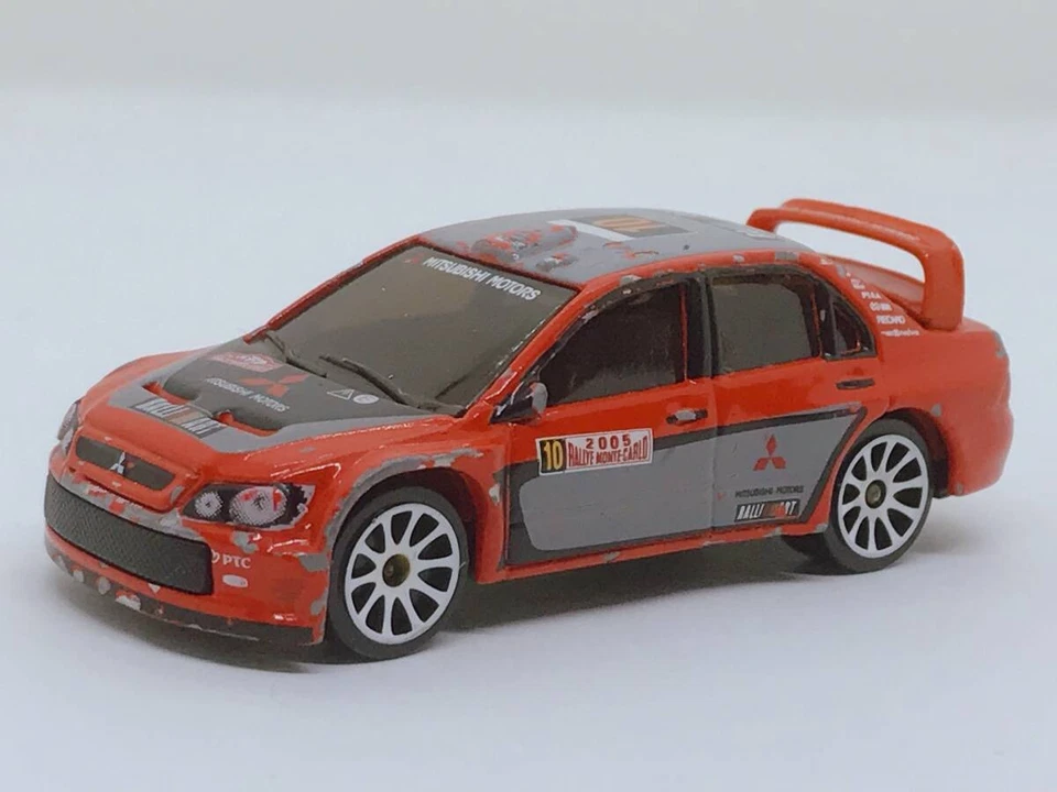Un'auto pressofusa taglia 14 Tomica Majorette Mitsubishi Lancer WRC Ralliart ... - Immagine 1 di 4