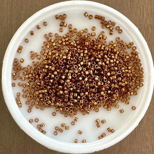 11/0 Miyuki Seed Beads,Delica,Metallic Lt Bronze (DB0022L) (DB022L) (DB22L), 5g - Picture 1 of 1