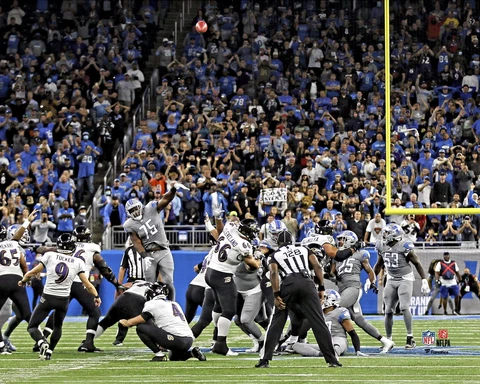 Justin Tucker Ravens UnSigned Game Clinching NFL Record 66-Yard Field Goal Photo Cover