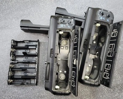  Lote Empuñadura Batería Canon Vintage BG-E2 y Enrolladora Eléctrica Canon A - Colección  Foto 1 de 4