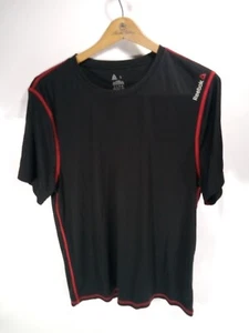Camiseta Reebok Para Hombre Rendimiento Ropa Interior Negra L Mangas Cortas Cuello Redondo Nueva Sin Etiquetas - Imagen 1 de 3