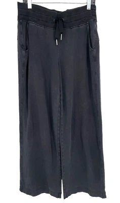 Athleta Mujer Talla M Balance Pierna Ancha Sudadera-Pantalón Terry Negro Bolsillos de tiro alto Foto 1 de 4