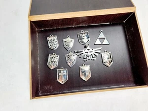 Lot of 10 The Legend of Zelda Pendants Necklace Bracelet Pieces 2013 & Case - Picture 1 of 4