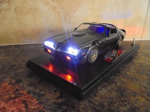 SMOKEY & THE BANDIT TRANS AM WITH WORKING LIGHTS 1/24 CAR IN DISPLAY CASE - Picture 1 of 19
