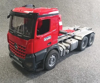 Bruder 1/16 Man TGS Truck w/ Roll Off Container & Schaffer Compact Loader 03767 - Image 1 of 4
