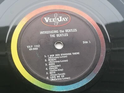 INTRODUCING THE BEATLES  1964 USA VEE JAY LP  LOVE ME DO  45 RPM RECORD LABEL - Image 1 of 4