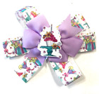 Beautiful Cupcake on a Stand inspired hair bow for girls.
