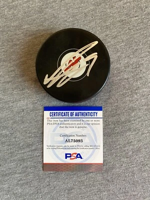 NEW JERSEY DEVILS- ALEXANDER HOLTZ AUTOGRAPH LOGO PUCK PSA AL75093 - Image 1 of 2