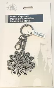 Portachiavi Tomorrowland Atom in metallo portamonete charm parchi Disney S01 - Foto 1 di 3
