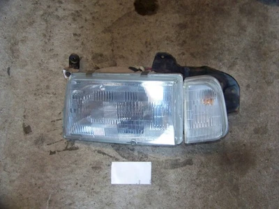 Chevrolet Chevy Tracker 1998 conductor faro izquierdo intermitente con soporte OEM Foto 1 de 4
