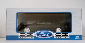 MODELLAUTO MCG18306 FORD SIERRA COSWORTH DUNKELGRAU MIT OZ RÄDERN NEUWERTIG VERPACKT 1:18 - Bild 1 von 9