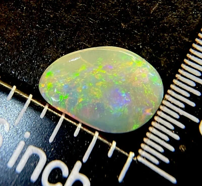 0.7 TCW Lightning Ridge N6-7 Black Opal. Beautiful Orange/Yellow/Violet. - Image 1 of 4