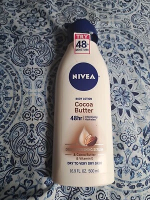 Loción corporal de manteca de cacao Nivea piel seca 16,9 oz vitamina E hidrata intensamente Foto 1 de 2