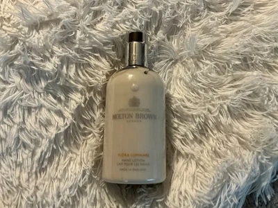 Loción Molton Brown Flora Luminare 10 fl oz/300 ml Foto 1 de 3