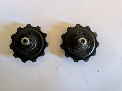 Paire de galets dérailleur vélo 11 dents SHIMANO - Photo 1/3