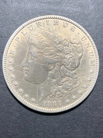 Morgan Silver Dollar,1884,condition fine to very fine,little wear, as pictured Cover