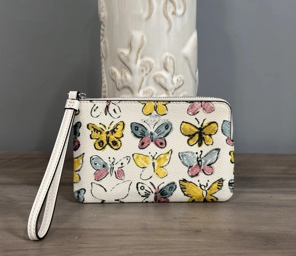 Coach Corner Zip Wristlet CAQ55 Chalk With Colorful Butterfly Printed Canvas