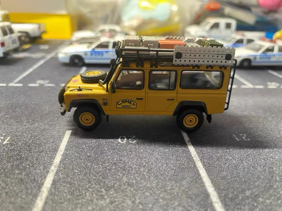 Mini GT 1:64 Land Rover Defender 110 Camel Trophy Winner TSM Model #108 Diecast - Image 1 of 4