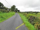 Photo 6x4 Road at Doosky Greenan&#39;s Cross Roads Heading west c2012