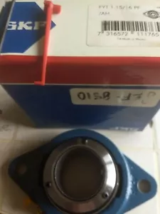 SKF 2 Bolt Flange Bearing FYT 1-15/16" PF/AH Concentra Lock New - Picture 1 of 4