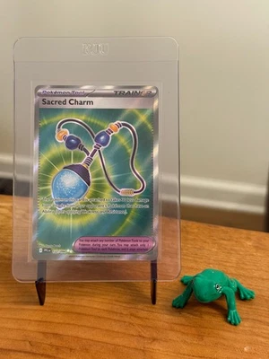 Sacred Charm 122/094 (Ultra Rare; NM) – Me02: Phantasmal Flames - Pokémon TCG - Image 1 of 2