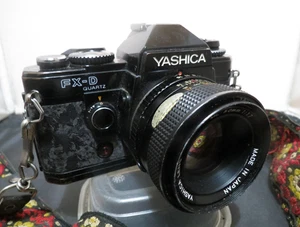 YASHICA FX-D Quartz 35mm SLR Camera w/ Yashica 50mm Lens + Strap + Instructions - Picture 1 of 12