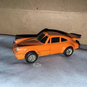 1984 Bandai GoBots Puzzler Kreuzworträtsel orange Porsche Oldtimer - Bild 1 von 9